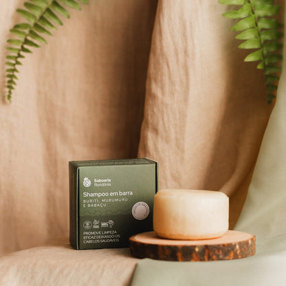 Shampoo sólido com bioativos amazônicos de buriti, manteiga de murumuru e óleo de babaçu. 